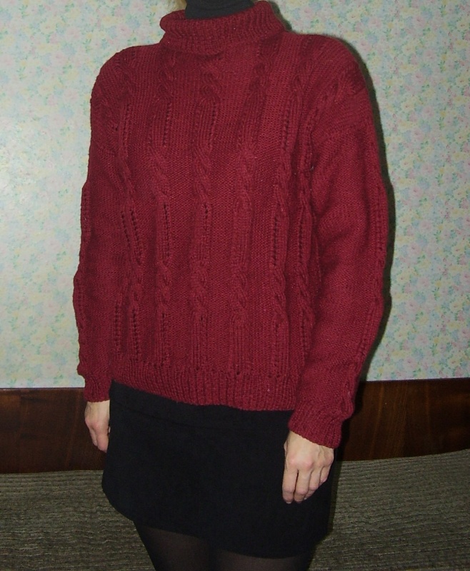 storas megztinis
