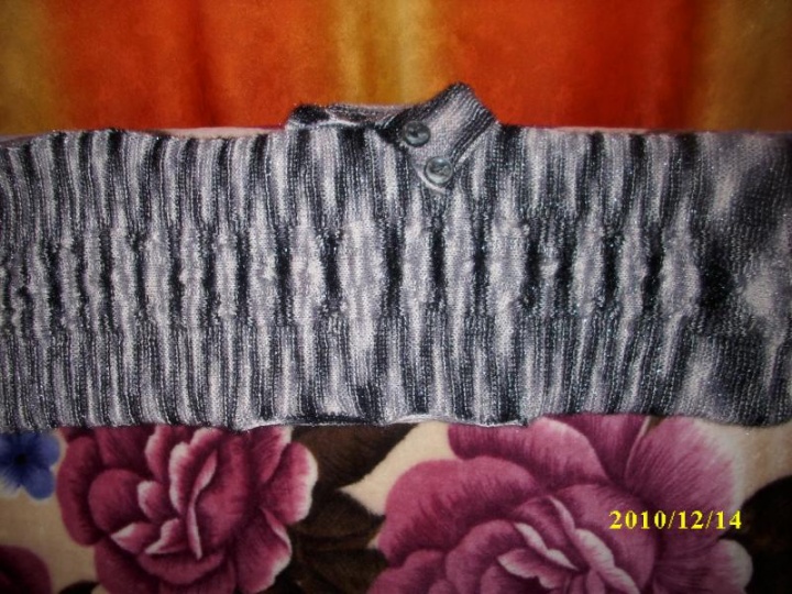 mot megztinis